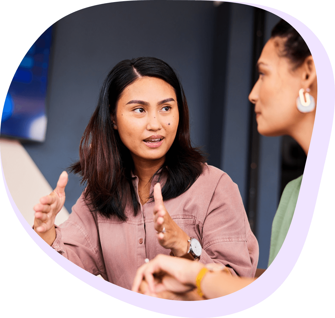 Engaged in a meeting conversation